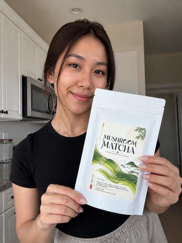 Customer drinking a mushroom matcha latte through a straw